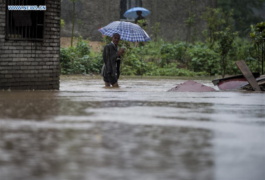 China warns of geological disasters as rainstorm triggers another orange alert