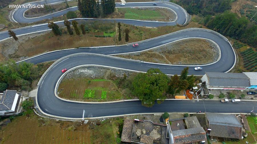 Winding road looks like jade belt around mountain in Central China