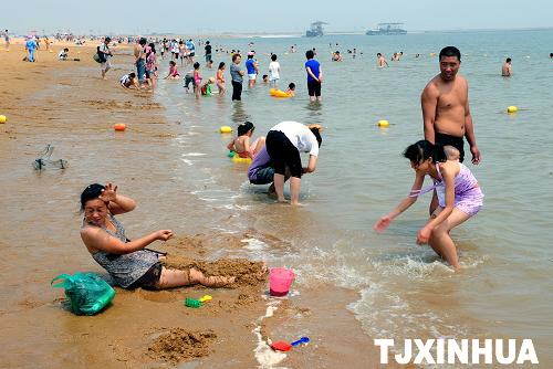 津門人工沙灘成京津游客新的親水避暑景區(qū)