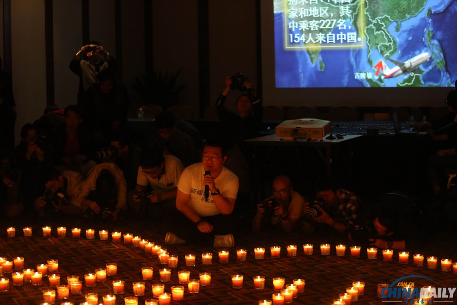 馬航MH370失聯(lián)客機(jī)整月 家屬為親人祈福守望