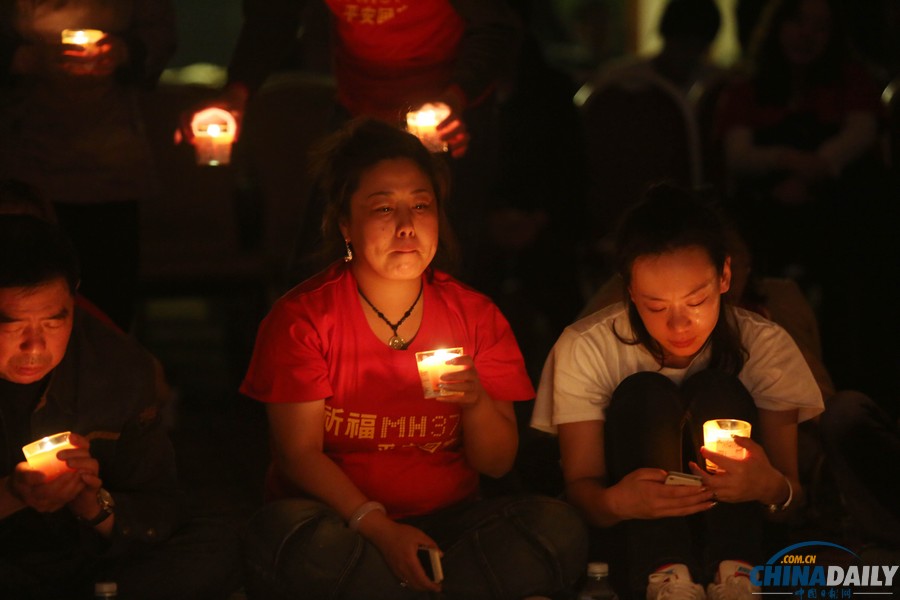 馬航MH370失聯客機整月 家屬為親人祈福守望