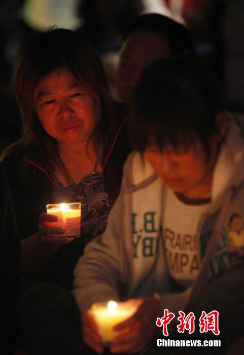 MH370航班失聯滿月 在京乘客家屬舉行祈福活動