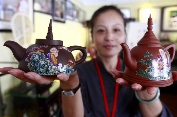 十八羅漢紫砂琺瑯彩壺在滬亮相