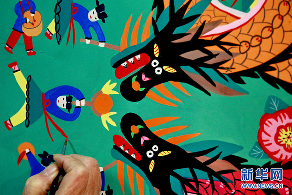 金山農民畫家繪新作迎龍年