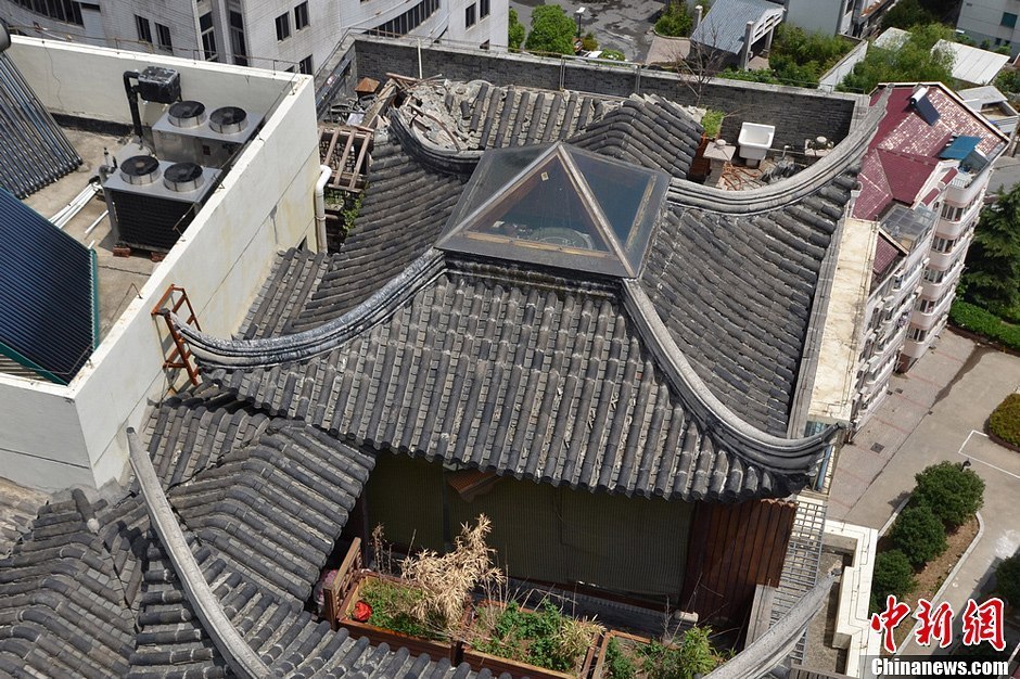 探訪(fǎng)蘇州樓頂“園林” 違建已開(kāi)始拆除