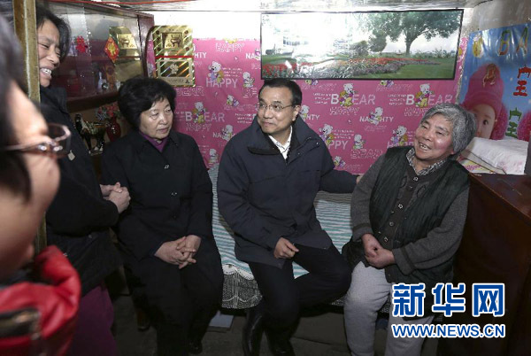 習近平李克強寒冬問民生