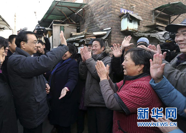 習近平李克強寒冬問民生