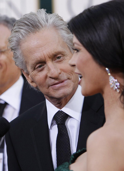 Catherine Zeta-Jones and Michael Douglas arrive at the 68th annual Golden Globe Awards