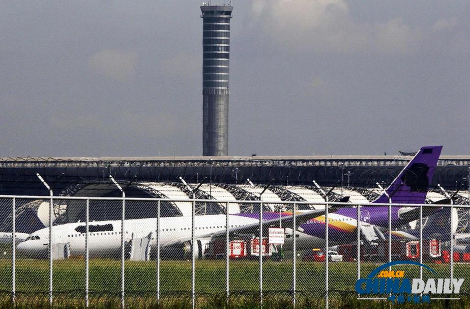 泰航一飛機(jī)因故障沖出跑道 9名中國(guó)乘客受傷（高清組圖）