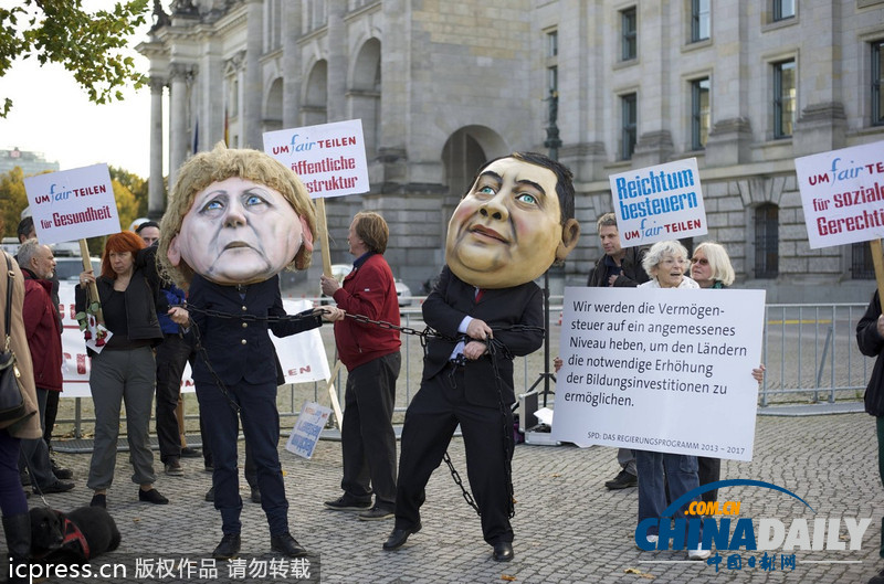 德民眾棄默克爾與社民黨主席“頭顱” 抗議兩黨聯合執政
