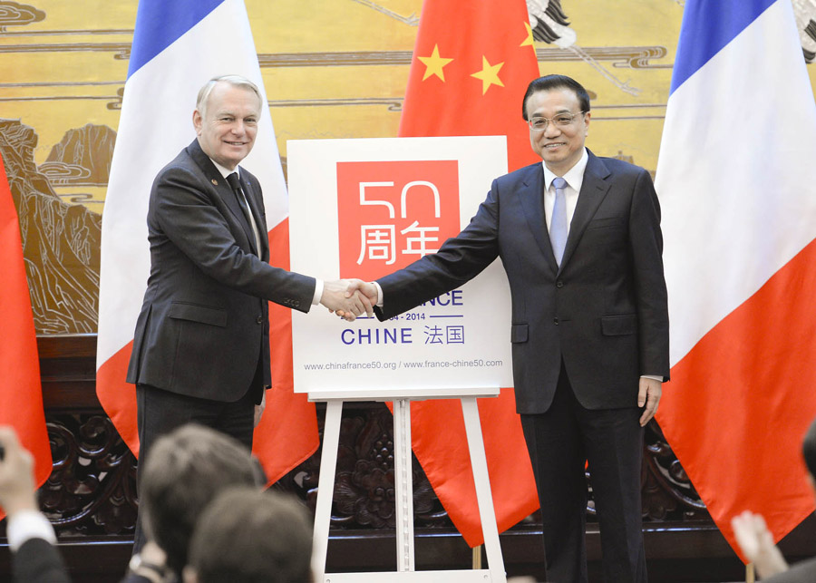李克強(qiáng)與法國總理埃羅共同為慶祝中法建交50周年徽標(biāo)揭幕