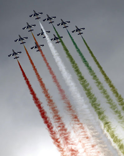 Members of the Italian aerobatic team Frecce Tricolori perform during the AirPower 13 air show at the Hinterstoisser air base in Zeltweg June 28, 2013. Austrian air show opens