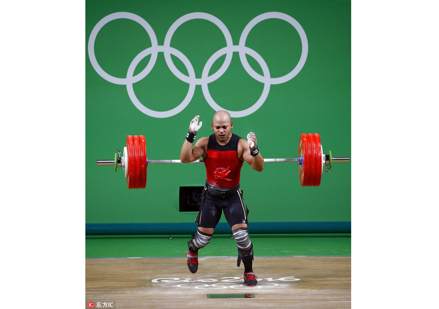 Chinese weightlifter Shi ZhiYong lifts gold
