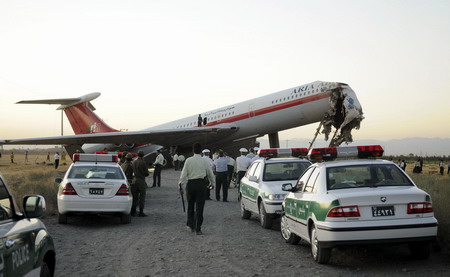 Plane hits wall at Iranian airport, killing 17