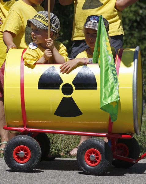Demonstrators take part in a protest to ask for the closure of the nuclear power plant of Fessenheim, in Fessenheim, France, June 26, 2011. Protesters demand French nuclear plant closure