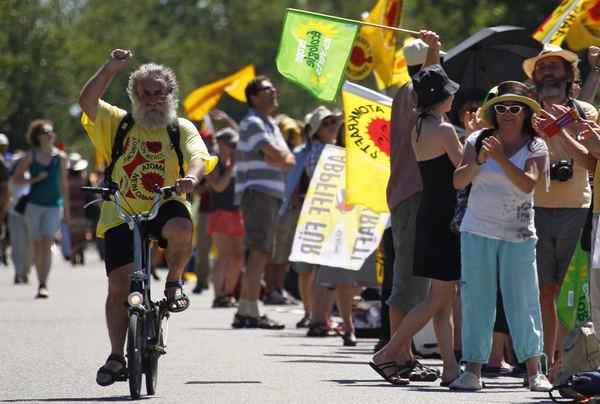 Demonstrators take part in a protest to ask for the closure of the nuclear power plant of Fessenheim, in Fessenheim, France, June 26, 2011. Protesters demand French nuclear plant closure